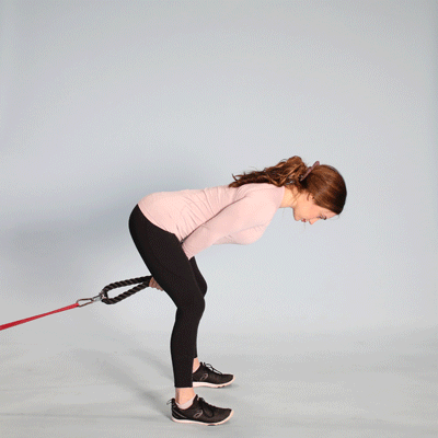 Woman doing Cable Pull-Throughs