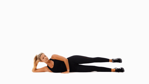 Woman doing Side-Lying Leg Raises