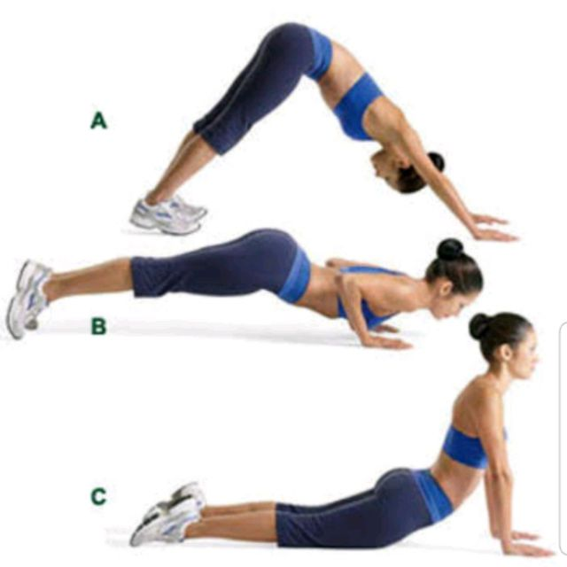 Woman doing Hindu Push-Up