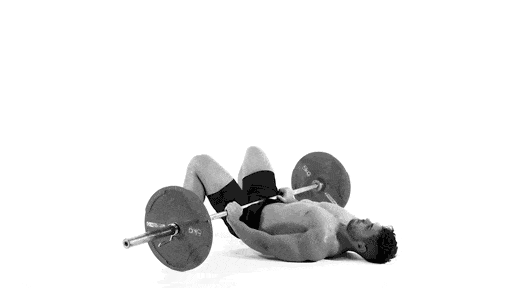Man doing Barbell Glute Bridge