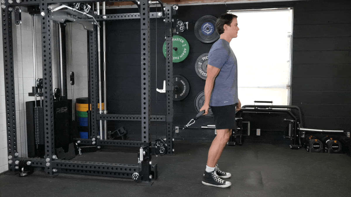Man doing Bayesian Cable Curl
