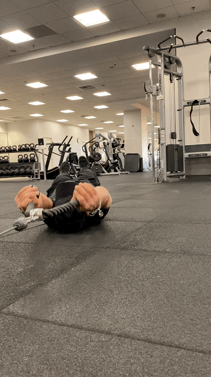 Man doing Cable Dead Bug