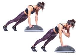 Woman doing BOSU Ball Shoulder Tap Plank