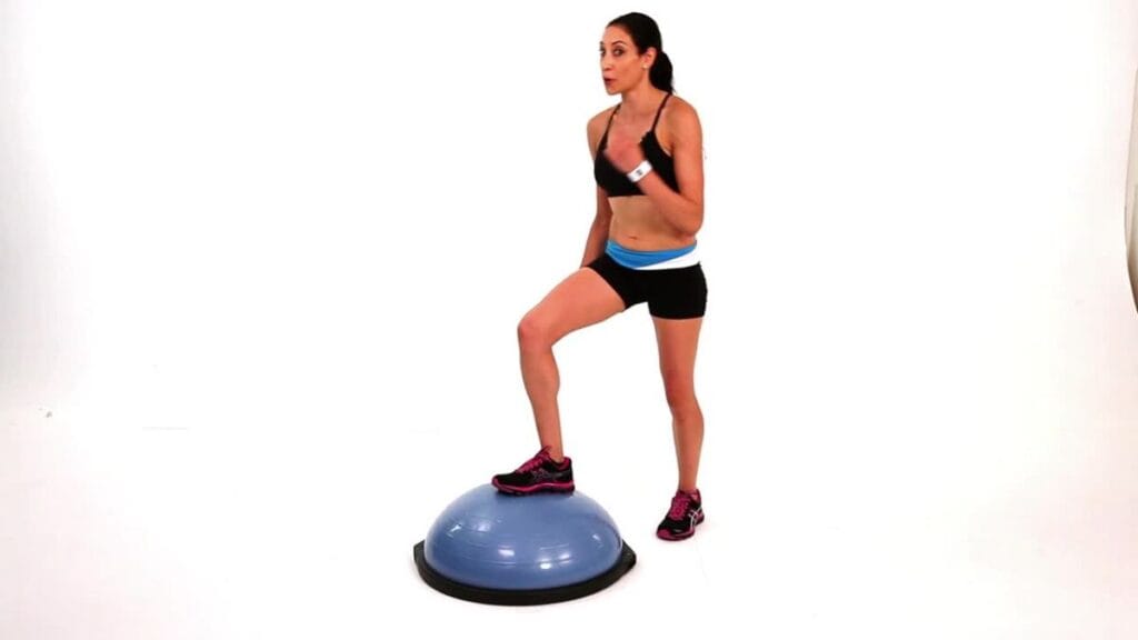 Woman doing BOSU Ball Step-Up