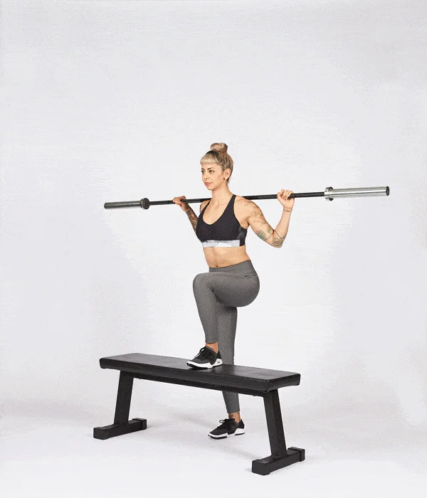 Woman doing Barbell Step-Up