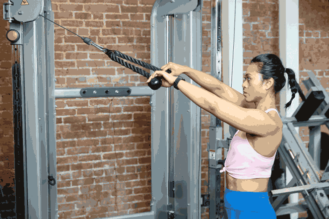 Woman doing Cable Face Pulls