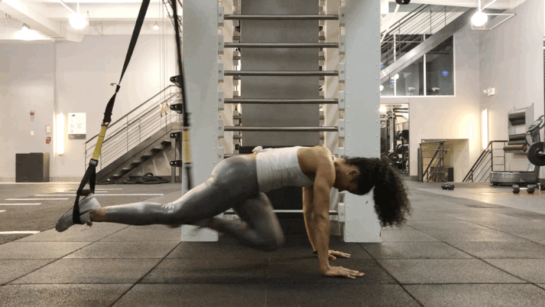 Woman doing Cable Pike
