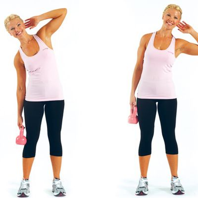 Woman doing Dumbbell Standing Oblique Crunch