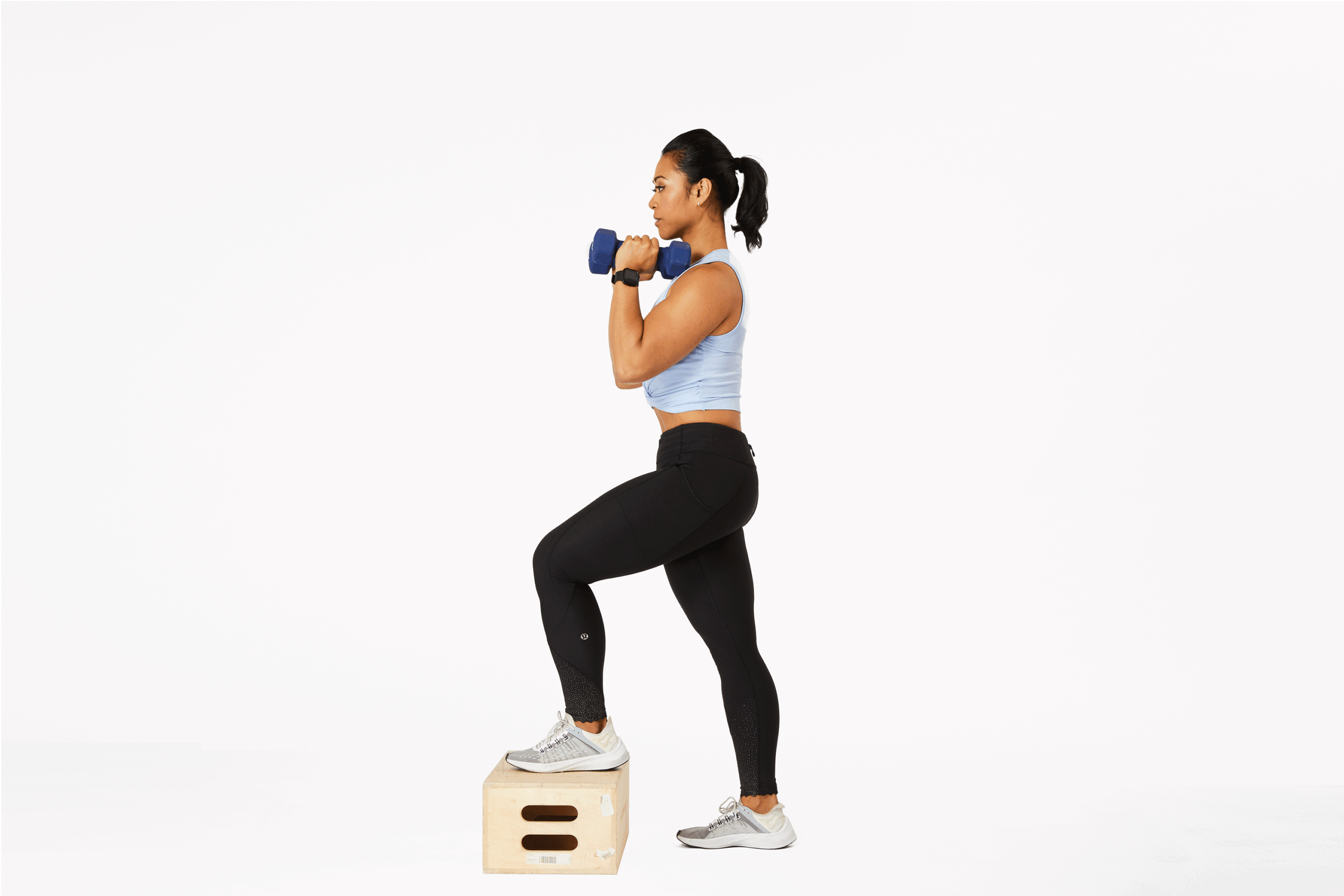 Woman doing Dumbbell Step-Up